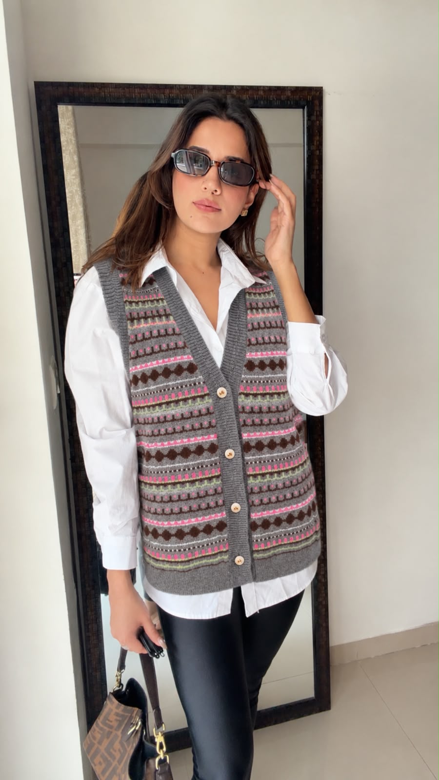 Buttoned fall knit vest